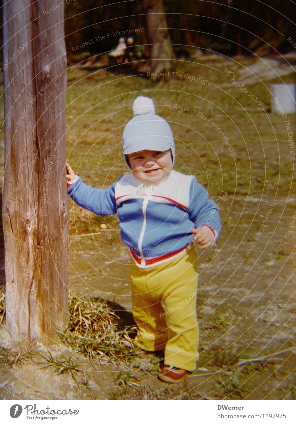 a few years ago Joy Happy Child Human being Toddler Body 1 1 - 3 years Beautiful weather Meadow Village Pants Jacket Cap Smiling Stand Friendliness Happiness