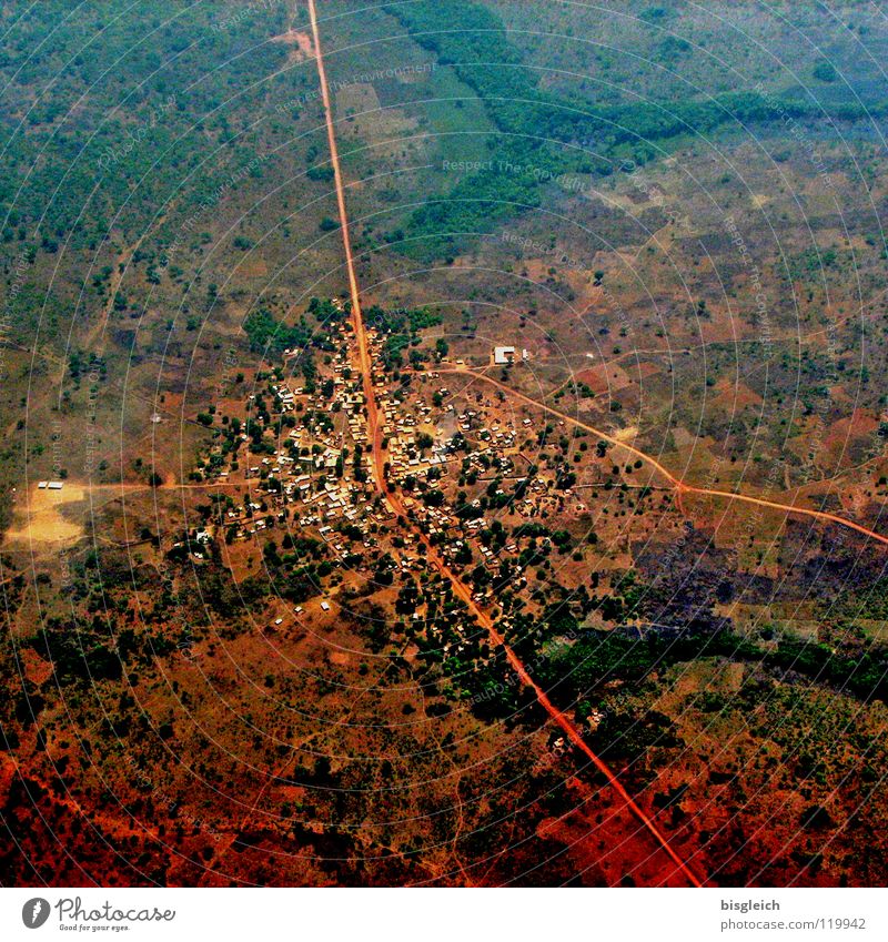Cameroon from above II Colour photo Aerial photograph Deserted Bird's-eye view Far-off places Aviation Landscape Africa Town Street Airplane Brown Day