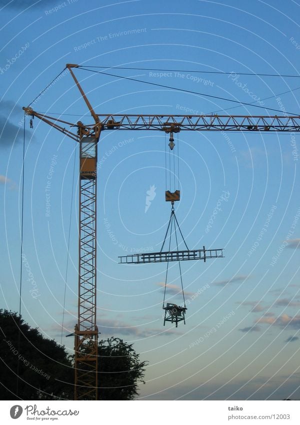 crane after closing time Crane Construction crane Machinery Construction site Dusk Closing time Electrical equipment Technology Sky Circular saw Ladder Blue