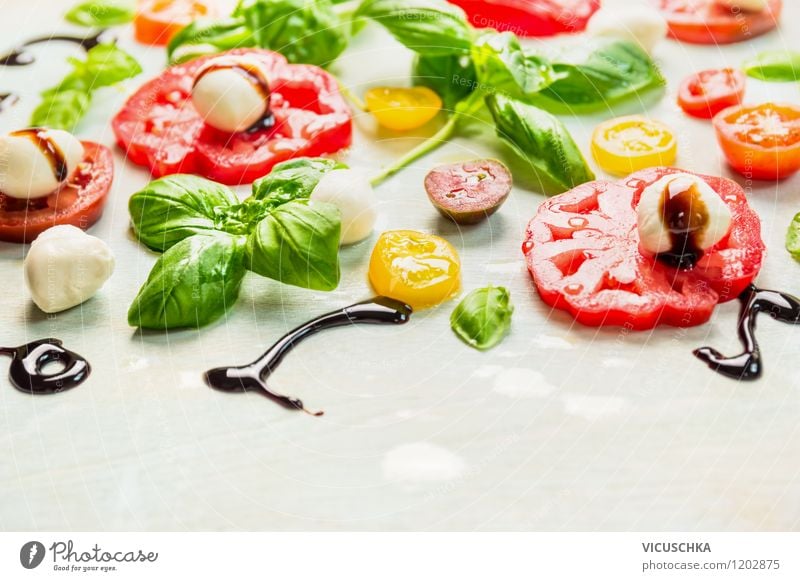 Appetite for summer: tomatoes and mozzarella Food Vegetable Herbs and spices Cooking oil Nutrition Lunch Organic produce Vegetarian diet Diet Italian Food Style
