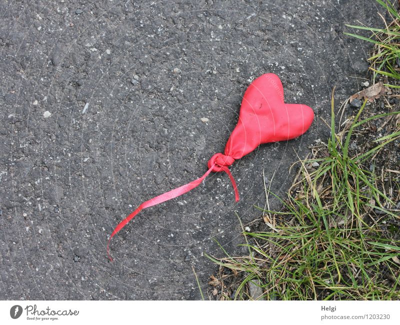 The air is out... Environment Nature Spring Plant Grass Street Roadside Asphalt Balloon Plastic Sign Heart Lie Authentic Exceptional Simple Kitsch Small Gray