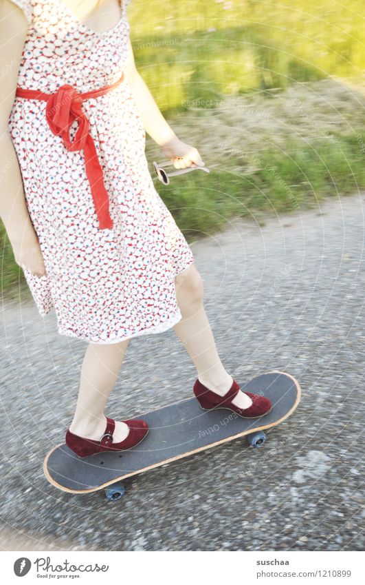 skateboarding Street Lanes & trails Asphalt Wayside Child Girl Dress Bow Footwear Legs Feet Skateboarding Driving Summer Brave Dangerous Whimsical Strange