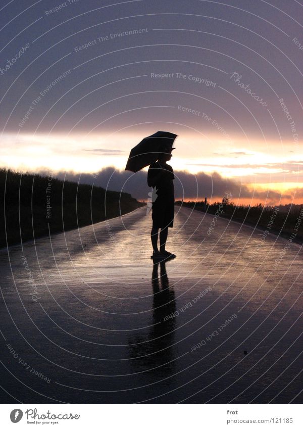 rainman Umbrella Twilight Reflection Long exposure Country road Wet Longing Loneliness Far-off places Sunset Hope Sky Contentment Rain Evening Silhouette