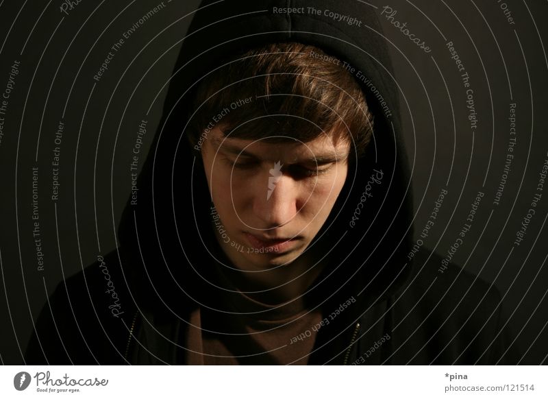 down Man Portrait photograph Light Grief Thought Think Emotions Threat Dark Artificial light Face Hooded (clothing) hoodie Contrast Shadow Sadness ponder Down