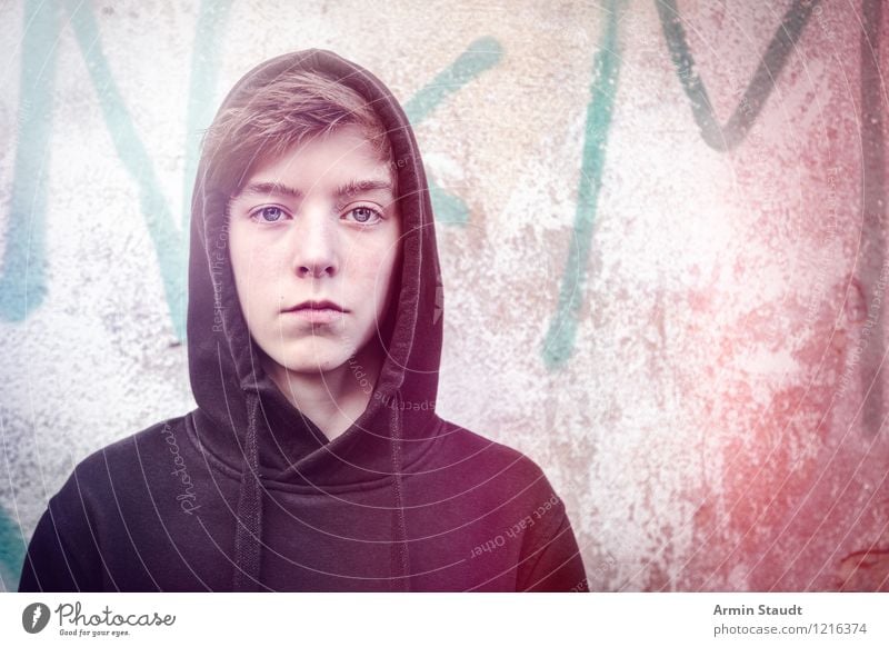 Portrait of a young man with hoodie Lifestyle Style already Human being Masculine Young man Youth (Young adults) 1 8 - 13 years Child Infancy Wall (barrier)
