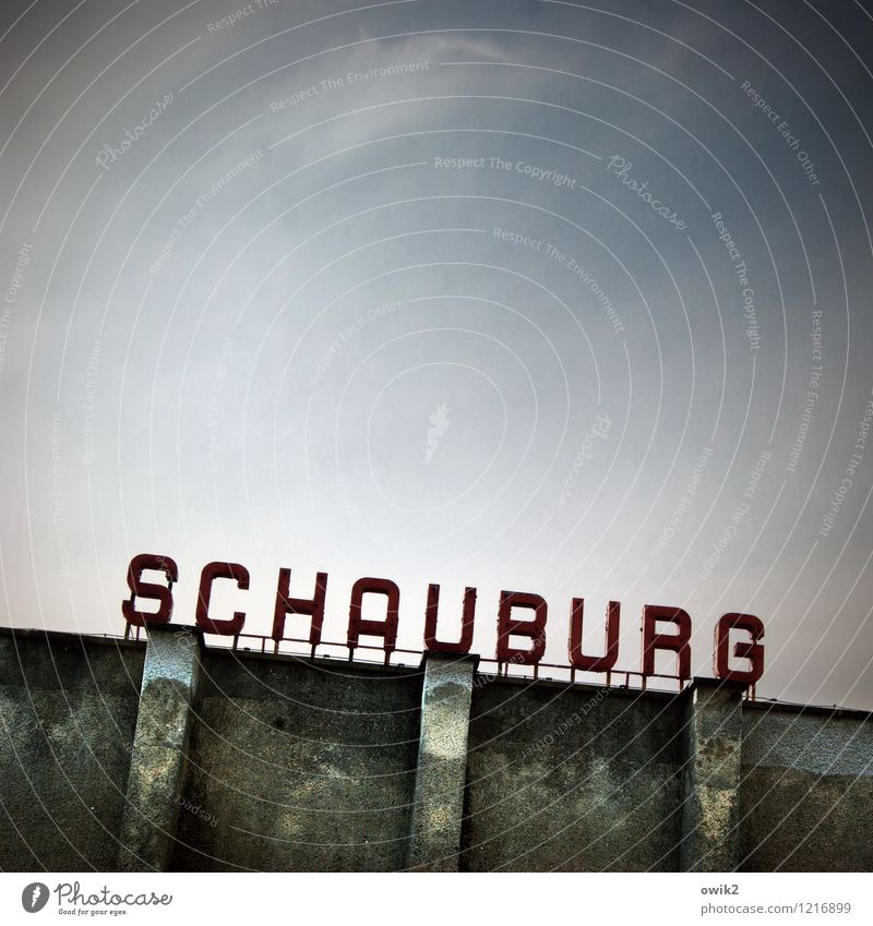 Old cinema Cloudless sky Castle Cinema Characters Dark Loneliness Mysterious Letters (alphabet) Schauburg Wall (building) Facade Concrete Gloomy Ravages of time