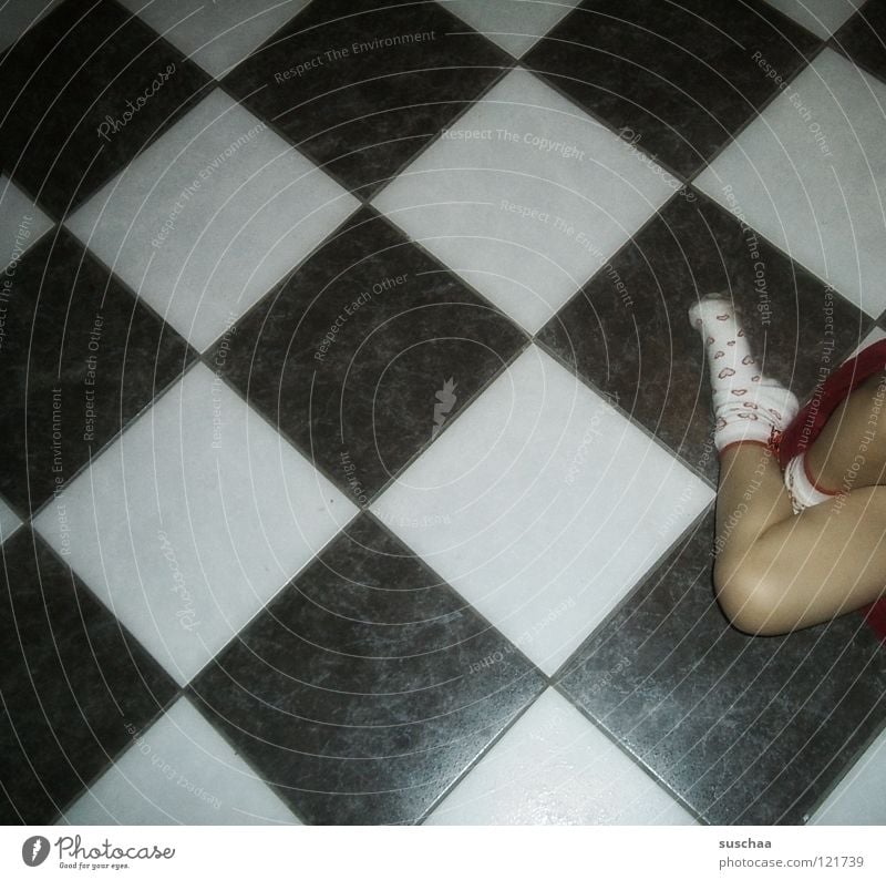 püppi goes to sleep after all .... Flow Floor covering Kitchen Child Toddler Stockings Playing Absurdity Household Joy Tile tiled floor Black & white photo