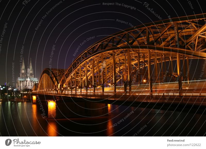 Cologne at night Long exposure Night Light Railroad House of worship Bridge Night shot Dome cathedral architecture train