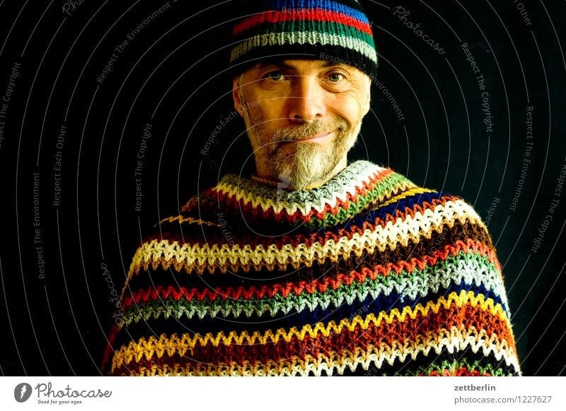 Man with knitted wool cap and crocheted wool blanket Human being Adults Senior citizen portrait Face Multicoloured Pattern Knitted Crocheted Stripe Cape Sweater