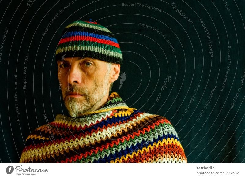 Knitting and crochet - man with knitted cap and crocheted poncho portrait Human being Man Face Eyes Nose Mouth Looking into the camera Face to face Adults