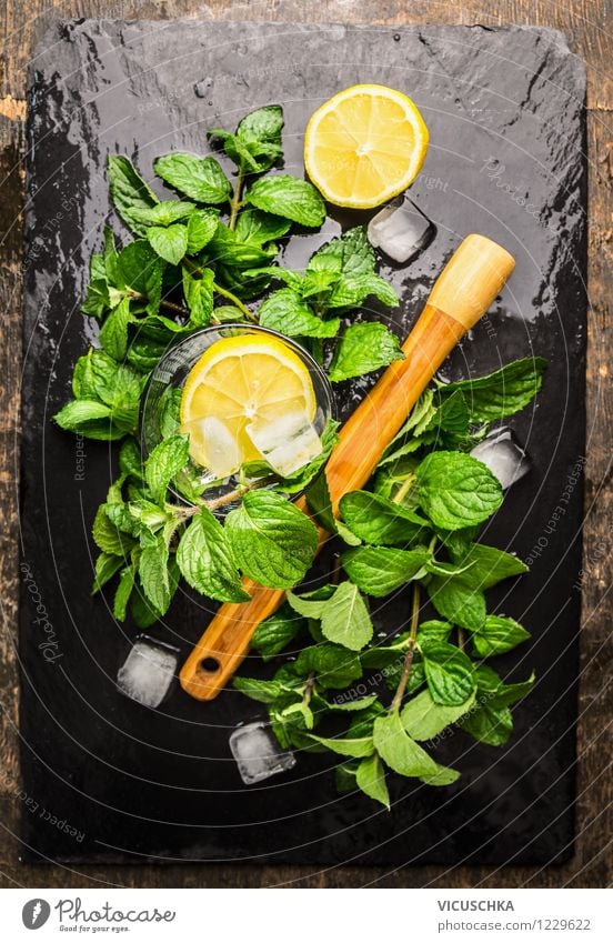Mint, lemon and ice cubes for lemonade Food Fruit Herbs and spices Organic produce Beverage Lemonade Longdrink Cocktail Style Design Life Summer Table Yellow