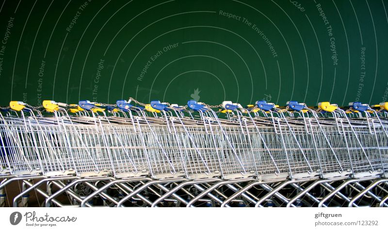 fleet Shopping Trolley Metal Green Supermarket Carriage Wall (building) Consumption Containers and vessels Shopaholic Row Beaded Sequence Structures and shapes