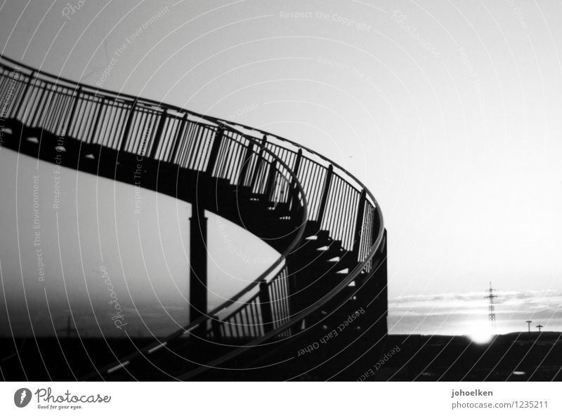 Upstairs, downstairs. Art Work of art Tiger and Turtle Cloudless sky Sunrise Sunset Sunlight Beautiful weather Duisburg Stairs Tourist Attraction Hang Creepy