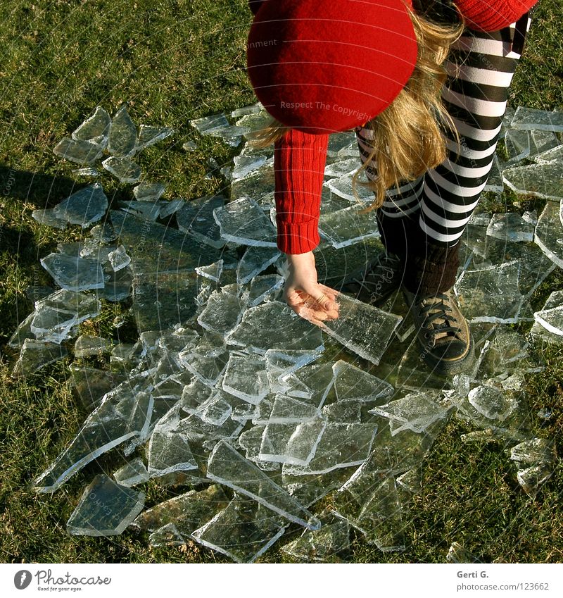 when the ice breaks Cold To break (something) Block Wet Frozen Ice Thaw Cocktail Mixture Tights Striped Red Blonde Hand Sweater Rope Grass Meadow Chucks Stoop