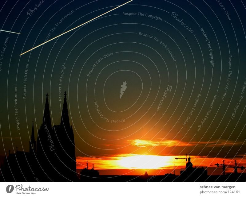 Facade view Cologne Sunset Yellow Airplane Town Winter Bright Dark Panorama (View) Crane House of worship Landmark Monument Dome Sky Shadow Looking Evening