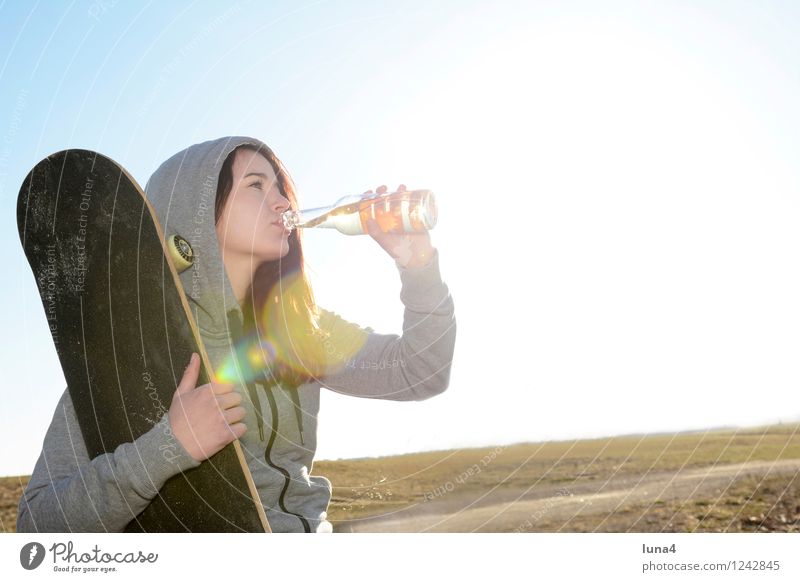 young woman with skateboard Beverage Drinking Cold drink Lemonade Beer Bottle Lifestyle Human being Feminine Woman Adults Youth (Young adults) 1 18 - 30 years
