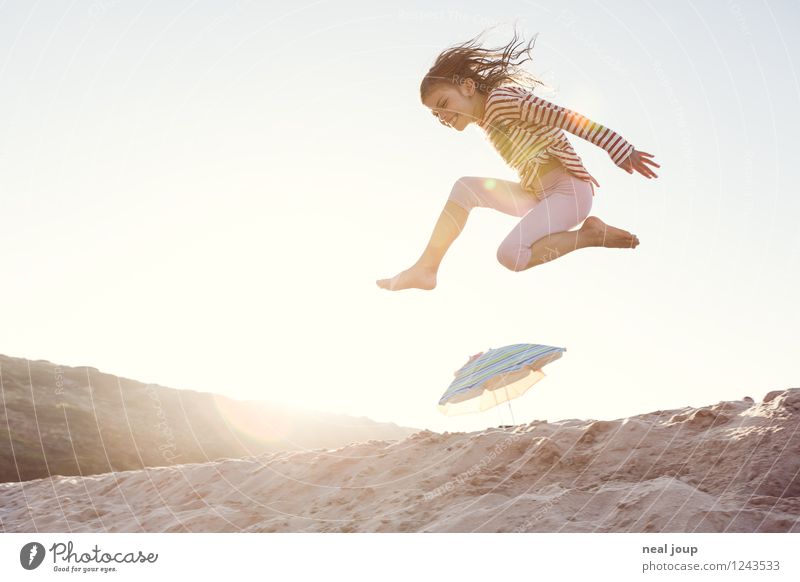 Jump for Joy -II- Girl 1 Human being 3 - 8 years Child Infancy Summer Beautiful weather Beach Portugal Long-haired Movement Flying Romp Happiness Happy