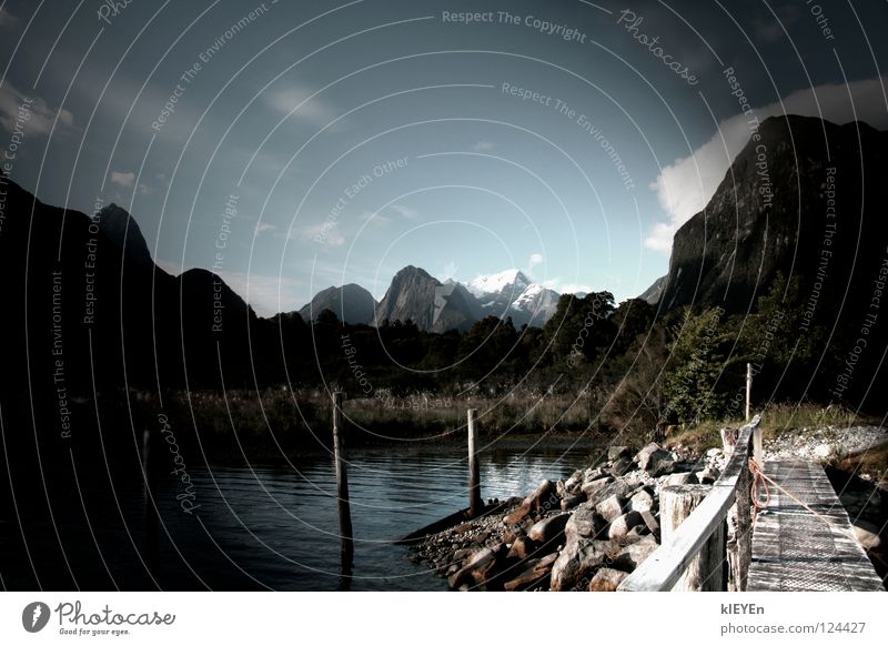 Land creates Footbridge Clouds Reflection Grass Wood Bushes Forest Vacation & Travel Relaxation New Zealand Water Mountain Sky Pole Stone Snow Shadow Handrail