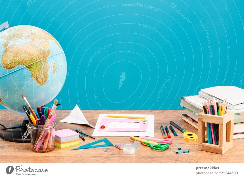 School accessories on desktop Desk Study Workplace Tool Scissors Compass (Navigation) Scale Book Globe Education background brush Crayon empty jar Pencil plane