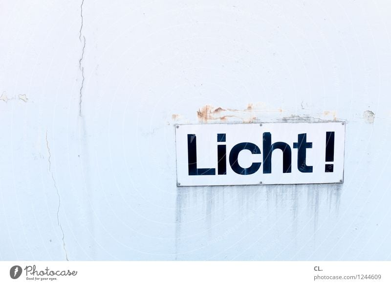 light! Wall (barrier) Wall (building) Characters Signs and labeling Signage Warning sign Dirty Bright Broken Light Colour photo Exterior shot Deserted