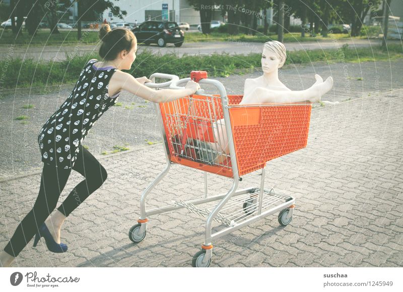 go shopping ...... Child Girl Young lady Youth (Young adults) Young woman Shopping Push Running Shopping Trolley Mannequin High heels Infancy Whimsical Strange