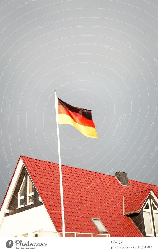 Germany flag flies over a new German building, house House (Residential Structure) Ensign Storm clouds German Flag Patriotism Detached house New building