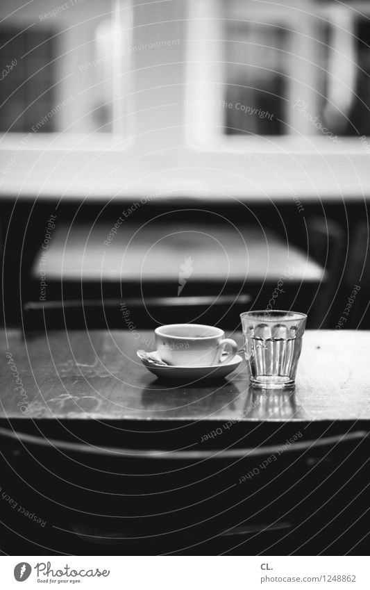 at the café Beverage Hot drink Drinking water Coffee Cup Glass Chair Table Break Café Restaurant Black & white photo Interior shot Deserted Day
