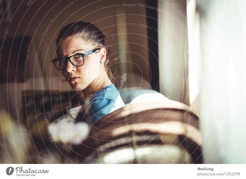 Rigid view of a woman in an apartment with sunlight Human being Feminine Young woman Youth (Young adults) 1 18 - 30 years Adults Observe Exceptional Threat
