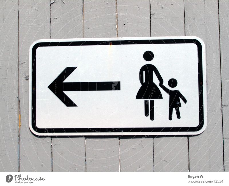 And the men? Woman Child Direction Fence Things Signs and labeling Arrow sign