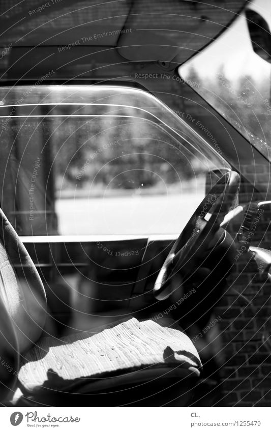 time machine Transport Means of transport Road traffic Motoring Car Handlebars Car Window Break Stagnating Black & white photo Deserted Day Reflection