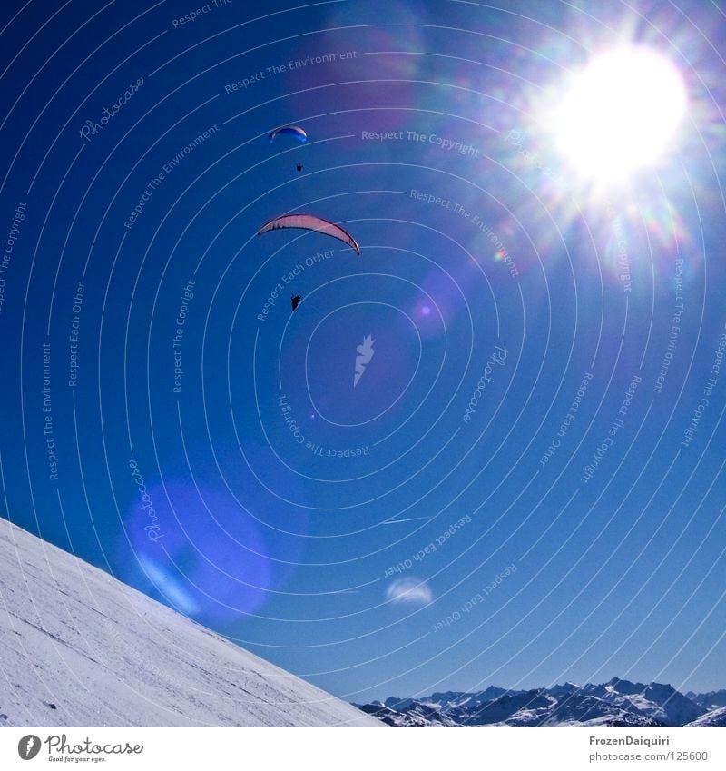 paraglider 1 Parachute Airplane Flying sports Vapor trail Reflection Paragliding Red Sunbeam Radiation Federal State of Tyrol Transport White Westendorf Winter