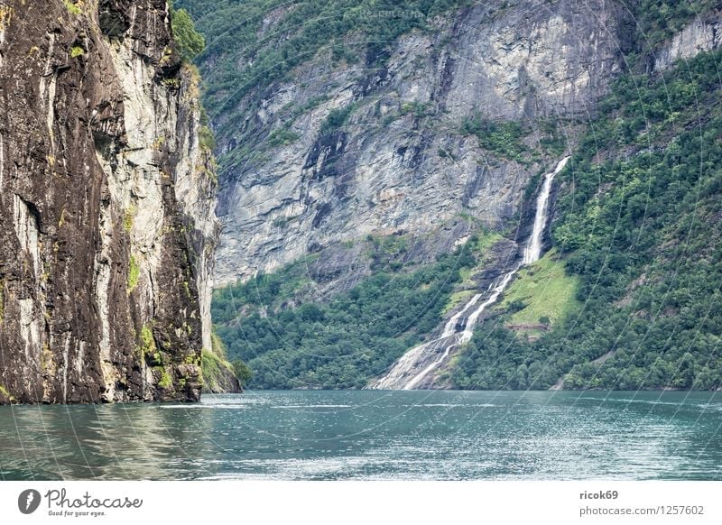Waterfall in the Geirangerfjord Relaxation Vacation & Travel Mountain Nature Landscape Clouds Fjord Idyll Tourism Norway Møre og Romsdal destination Sky voyage