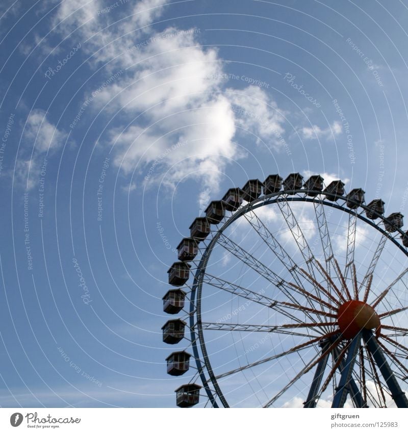 Ferris wheel Round Fairs & Carnivals Theme-park rides Carousel Rotate Large Attraction Joy Playing Leisure and hobbies Sky Level Tall all around Vertigo