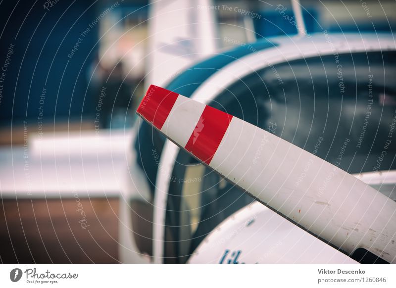 Propeller aircraft with two red stripes Design Vacation & Travel Industry Technology Art Exhibition Air Airport Transport Vehicle Airplane Aircraft Blue Red