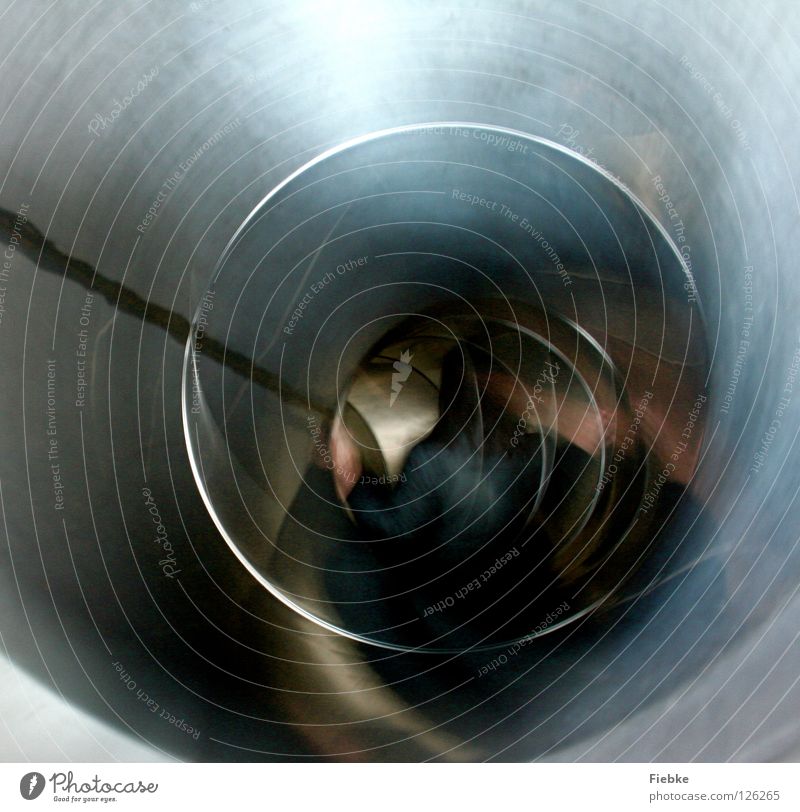 Journey to the center of the earth Slide Hard Tunnel Whirlpool Playground Playing Romp Time Light Longing Speed Simple Effort Joy Silver Metal Smoothness