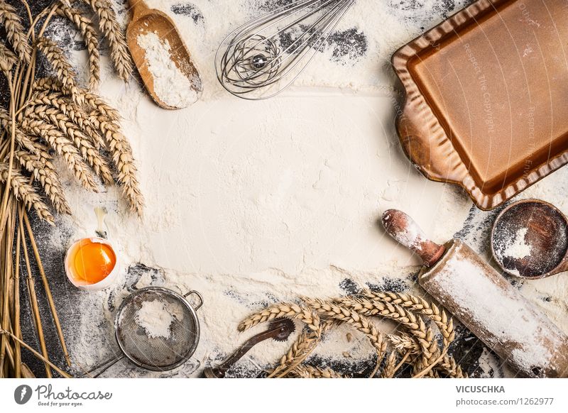 Flour background with equipment and ingredients for baking - a Royalty Free  Stock Photo from Photocase