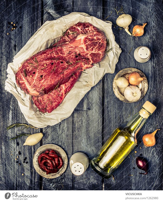 Marbled beef and cooking ingredients Food Meat Herbs and spices Cooking oil Lunch Dinner Organic produce Diet Bottle Style Design Healthy Eating Life Table