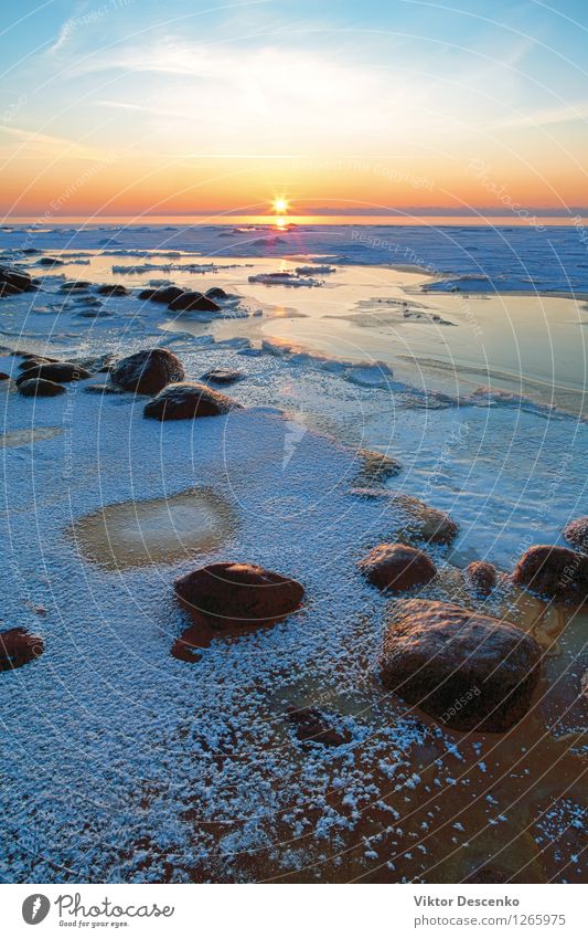 Sunset in the frozen sea with hoarfrost and stones Beautiful Relaxation Vacation & Travel Beach Ocean Winter Snow Nature Landscape Sand Sky Horizon Rock Coast