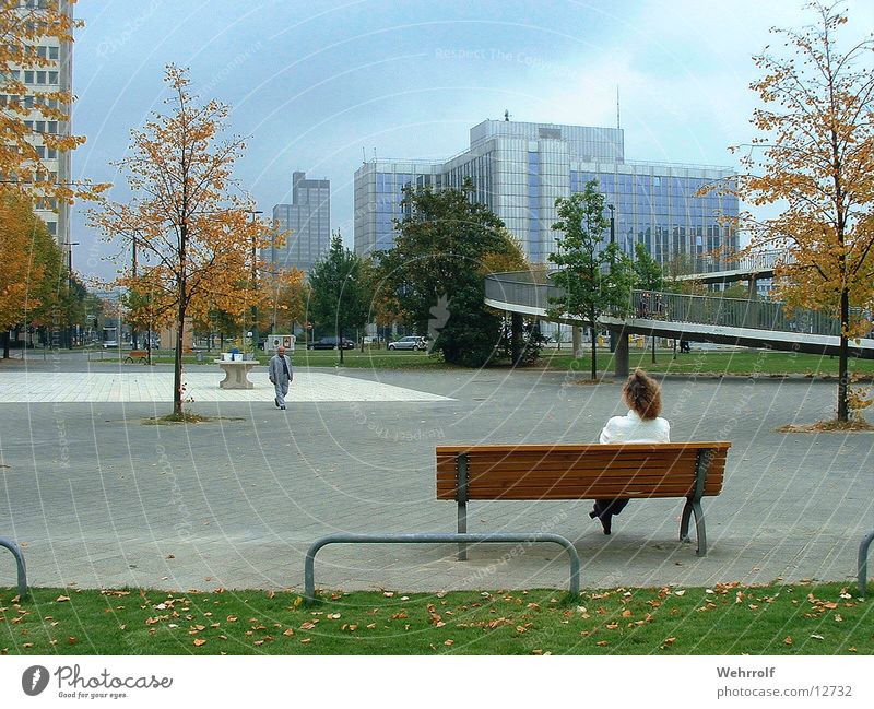 Peace and quiet in the city Woman Town Relaxation Downtown Calm Human being Bench Duesseldorf