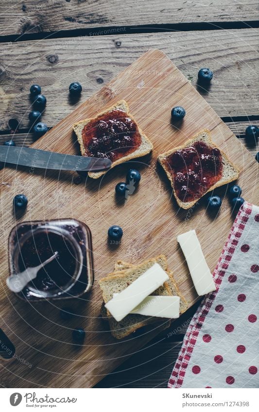 Toast bread with wild strawberry jam. Food Fruit Bread Dessert Jam Nutrition Breakfast Vegetarian diet Diet Summer Table Kitchen Wood Fresh Delicious Retro