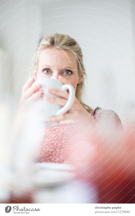 Woman with tea cup Tea Meditative Shallow depth of field Drinking Breakfast Interior shot Blonde 1 Person Cup Living room Bright To hold on Coffee Coffee cup