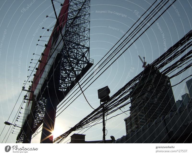 advertising media Evening Sun Construction site Cable Building Gigantic Large Might Advertising announcement outdoor advertising advertising wall Floodlight