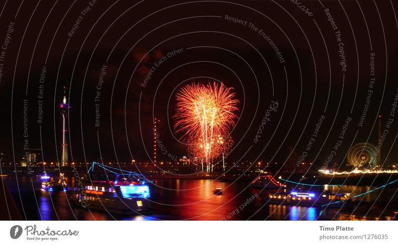 Fireworks Rheinkirmes 01 Night life Fairs & Carnivals Water Night sky River bank Duesseldorf Town Port City Bridge Passenger ship Ferry Multicoloured