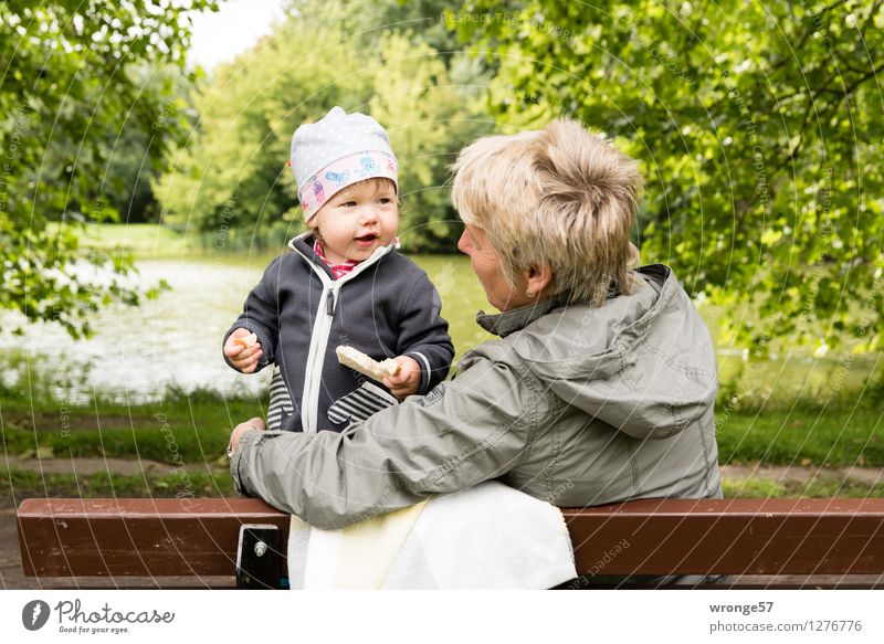 At the pond Human being Feminine Child Toddler Girl Woman Adults Female senior 2 1 - 3 years 45 - 60 years Relaxation Happiness Brown Yellow Gray Green White