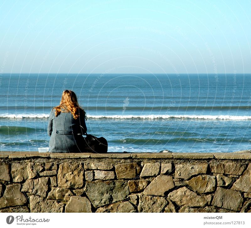 lonely world. Wall (barrier) Woman Far-off places Ocean Waves Blue Future Ambiguous Youth (Young adults) Fear of the future Community service Concentrate Sit