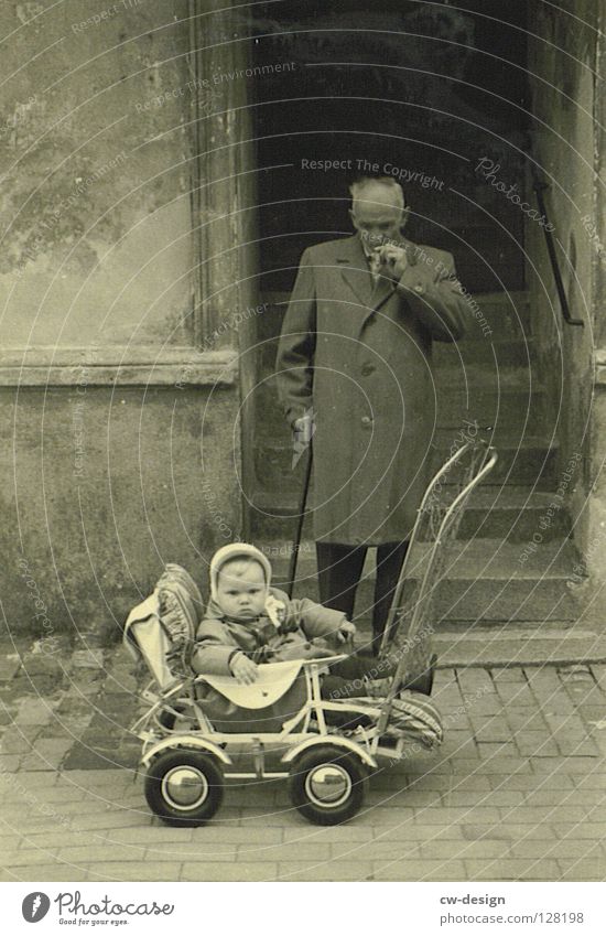 50ies - OPA PORSCHE Old Historic Black & white photo Child Childhood memory Male senior Exterior shot Grandfather Smoking Smoky Baby carriage Toddler Retro Coat