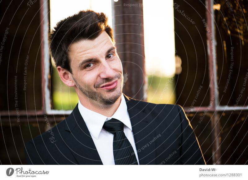 Man with a suit tie and a smile on his face Suit Smiling kind Congenial portrait Face Positive Friendliness Businessman