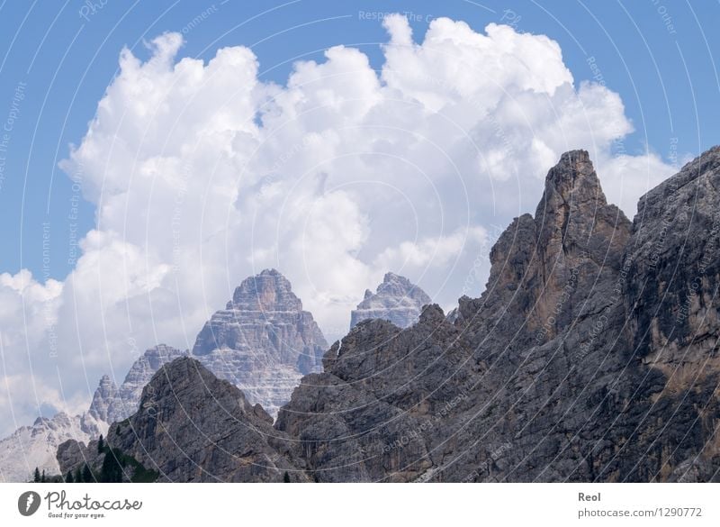 Clouds and rocks Environment Nature Landscape Elements Sky Summer Beautiful weather Rock Alps Mountain Dolomites South Tyrol Three peaks Peak Steep face Stone