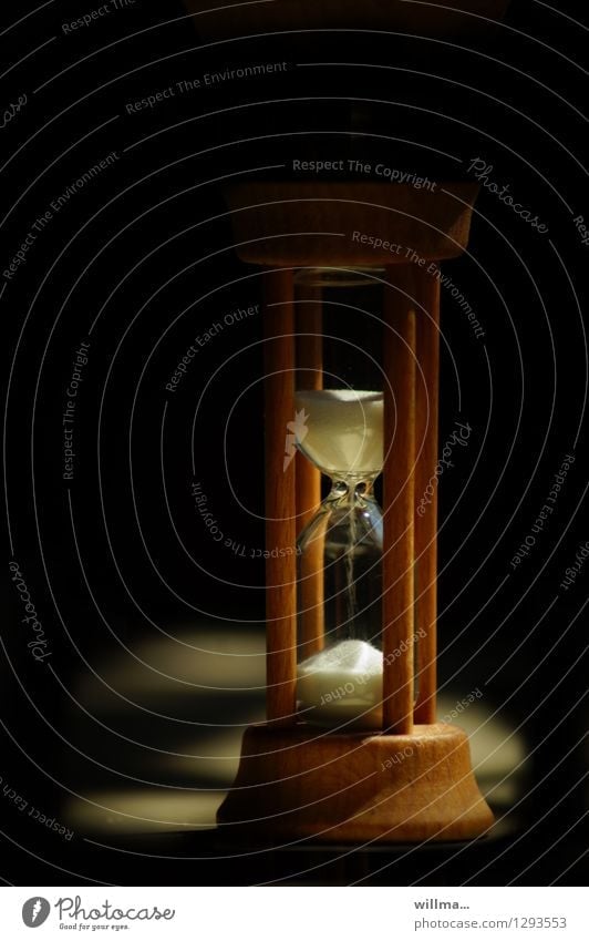Time is running out, hourglass Hourglass Eternity lifetime Sand Trickle Wait Dark Slowly Clock Patient Colour photo Melt away Seep