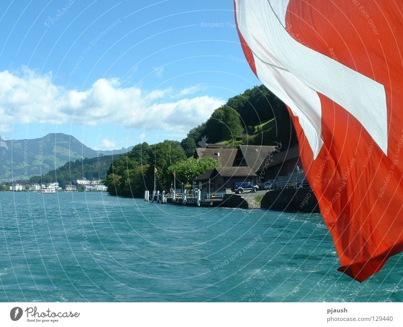 Steamer trip on Lake Lucerne Switzerland Flag House (Residential Structure) Water Mountain